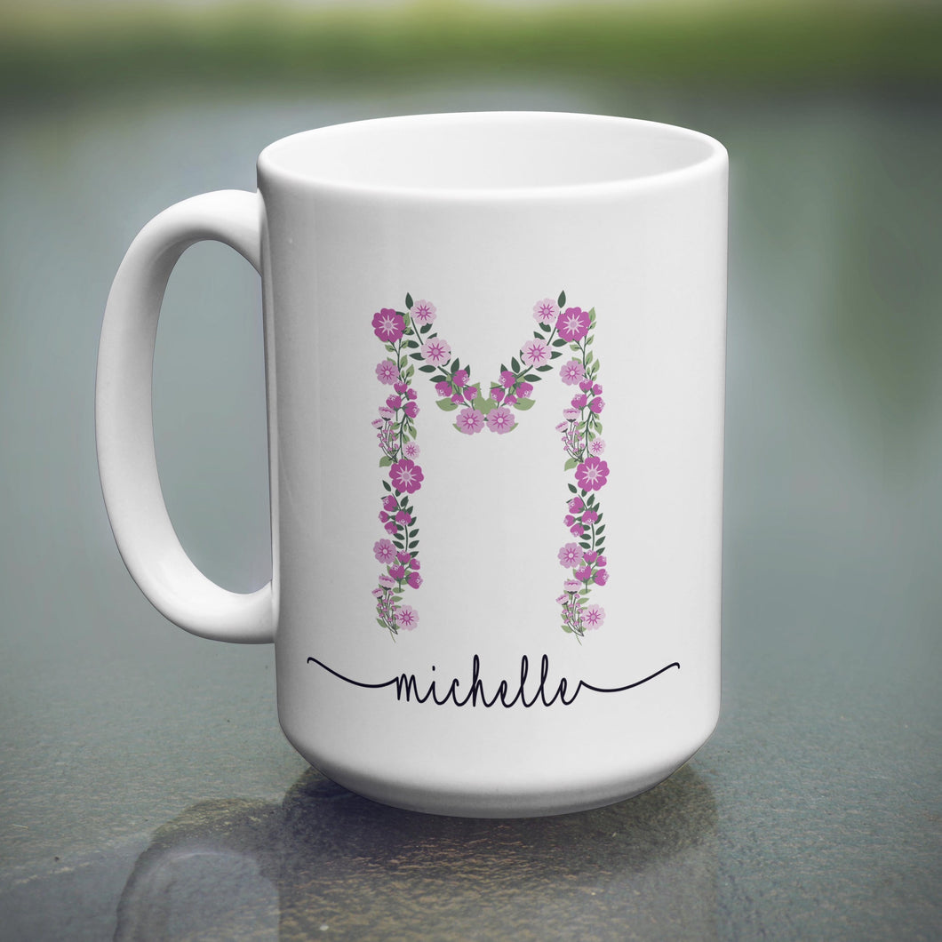 white coffee mug with a pink floral letter personalized with a name